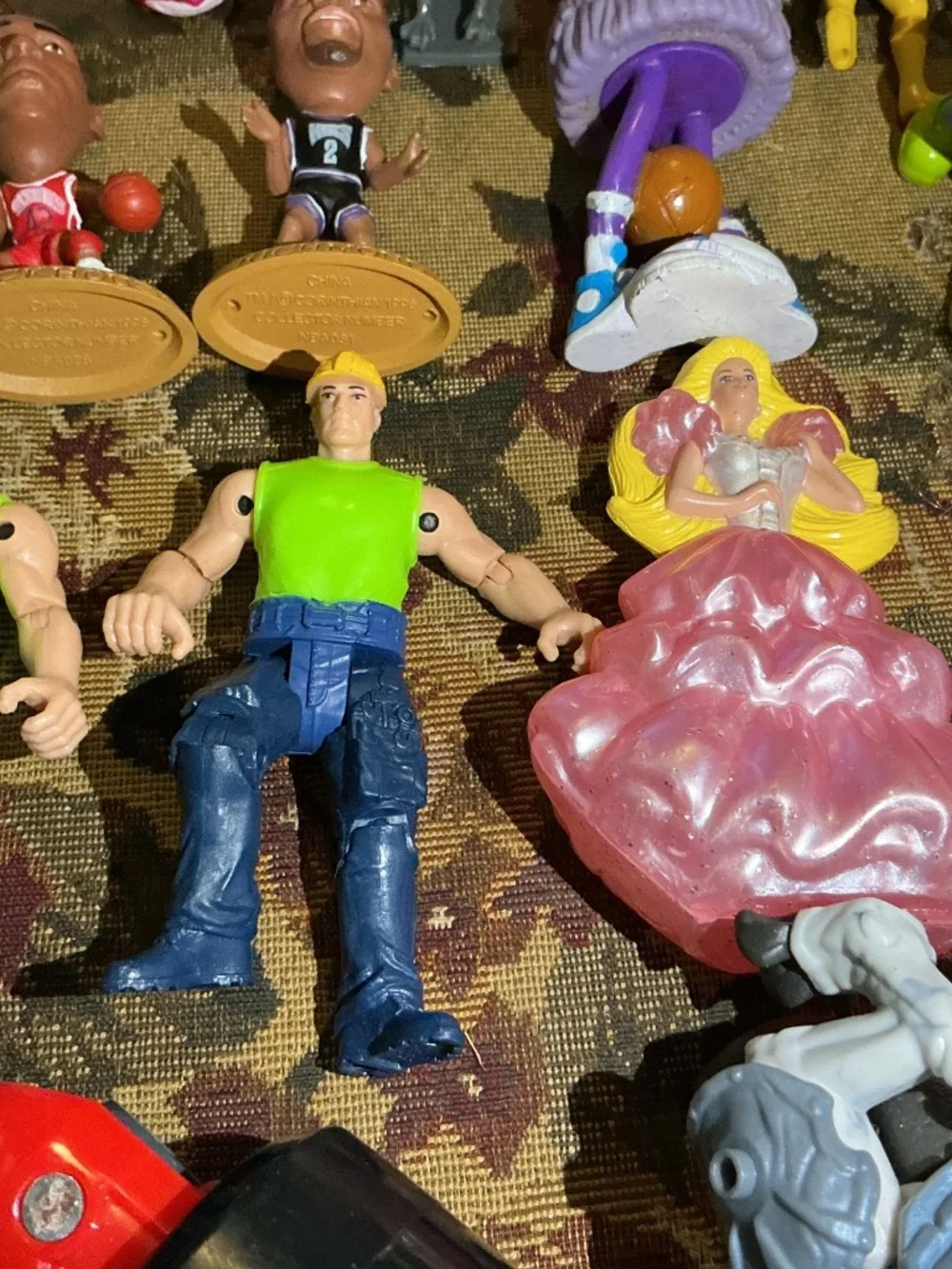 32 Miscellaneous small Toy lot with NBA Bionicle looney tune barbie and more